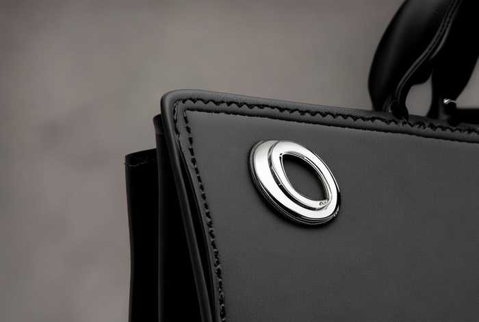 ku包包的标志；ku'qi品牌包包标志