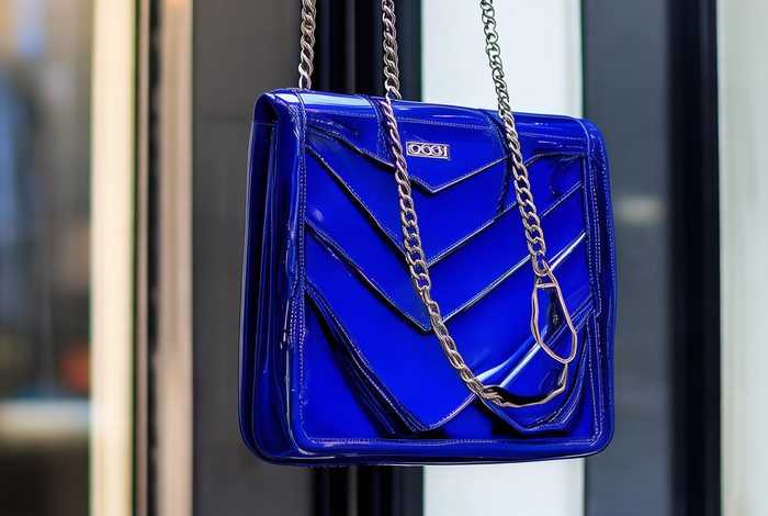 coogi是什么牌子的包包贵吗，coogi包包属于什么档次的牌子