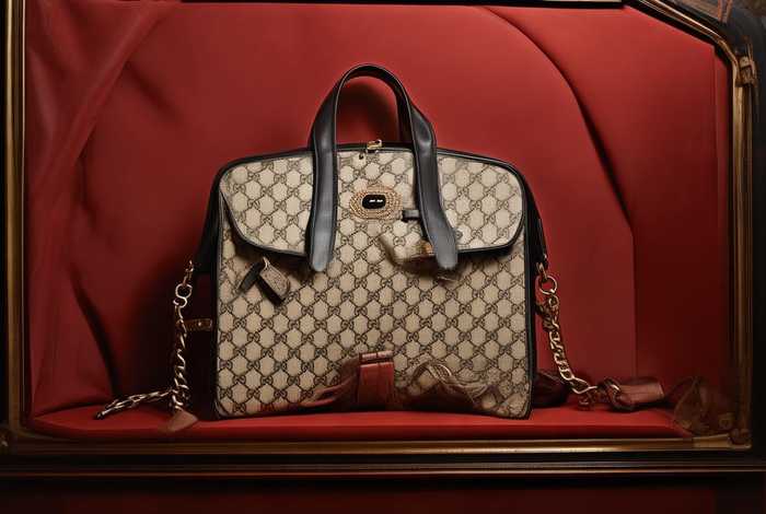 古奇官网gucci包包酒神（古奇官网gucci包包酒神是真的吗）
