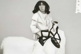 蔻驰名牌包包标志（蔻驰名牌包包标志和图案）