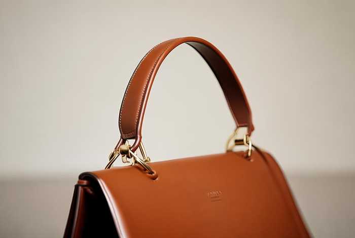 女士手提包手拎包（女士手提包手拎包图片）