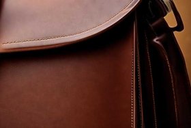 奢侈品男士手拿包真皮正品；奢侈品男士手拿包真皮正品图片