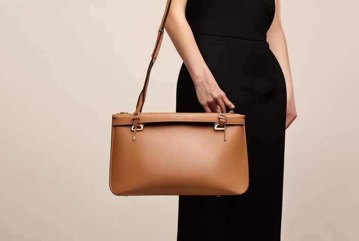 女士真皮包包第一名的（女士真皮包包第一名的品牌）