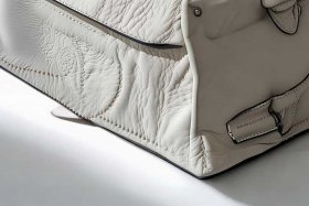 哭泣包包怎么辨别真假 哭泣包包怎么辨别真假视频