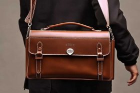 男士包单肩斜挎包真皮（男士真皮手提单肩斜挎包）