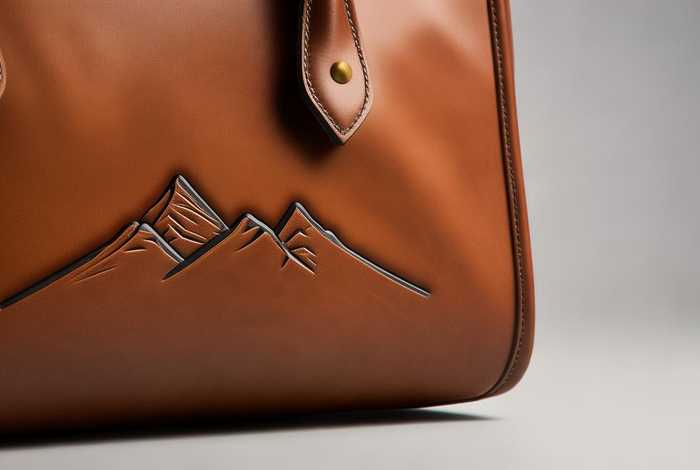 两个山的logo是什么牌子包包 - 两个山的logo是什么牌子包包图片