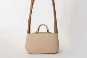 女士帆布迷你小布包斜挎（女士帆布迷你小布包斜挎包图片）