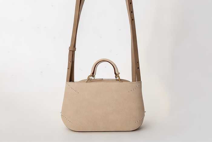 女士帆布迷你小布包斜挎（女士帆布迷你小布包斜挎包图片）